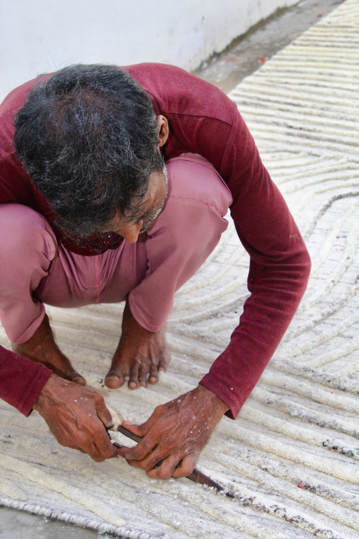 Carving the pile by hand