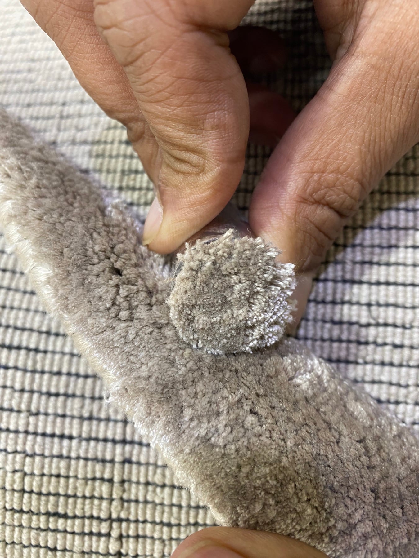 Close inspection of a custom rug pile and construction